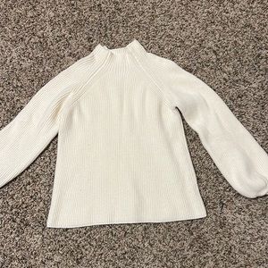 White knitted sweater